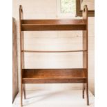 A standing oak book trough/shelf.