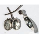 Two silver lockets and two silver pendants, 1.28toz.
