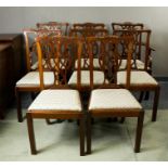 A set of eight Chippendale style mahogany dining chairs, including two carvers, with pierced and