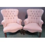 A pair of Victorian style buttoned back linen upholstered chairs.