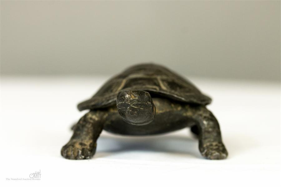 A dark patinated cast metal tortoise. - Image 3 of 3