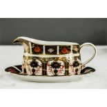 A Royal Crown Derby Old Imari Japan sauce boat and stand, no1128.