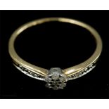 A 9ct gold and diamond cluster ring, size J, 1.2g.