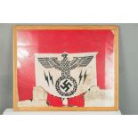 A Nazi flag, framed, 54 by 44cm.