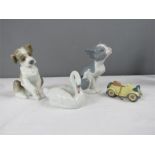 Lladro: four figurines; cat, New Friend, Elegant Swan and Little Roadster.