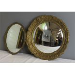 A small oval giltwood mirror, together with a circular Rococo style wall mirror. (2)