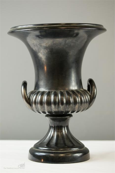 A Beswick ceramic urn with a dark grey lustre glaze.