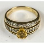 A 9ct diamond and citrine ring, size L, 3.9g