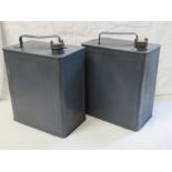 Two painted jerry cans.