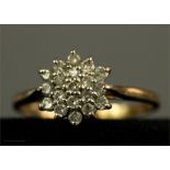 A 9ct gold and diamond cluster ring, size S, 2.3g.