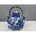 An Allen Line blue and white twin spouted teapot.