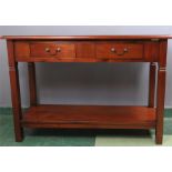 An Ancient Mariners mahogany side table with two drawers, and low shelf, bearing tag to the side.