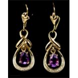 A pair of yellow metal amethyst and diamond earrings, 2.7g.