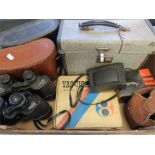 A quantity of binoculars and camera equipment including a 1960s Yashica camera.