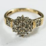 A 9ct gold and diamond cluster ring, size L, 2.5g.