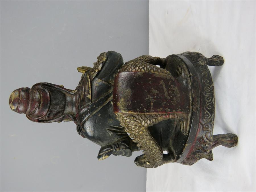 A Chinese bronzed figure of a seated man, bearing residual gilding. - Image 3 of 5