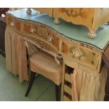 A French style painted dressing table with shaped glass top, mirrored back and drawers to the sides,
