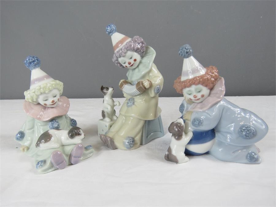 Lladro: Perriot with Puppy, Perriot with Puppy and Ball and Perrior with Concertina. (3)