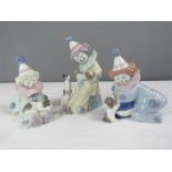 Lladro: Perriot with Puppy, Perriot with Puppy and Ball and Perrior with Concertina. (3)