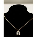 An 18ct gold sapphire and diamond pendant and chain, 6.1g.