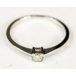 A 9ct white gold and diamond ring, princess cut, size Q 1.4g.