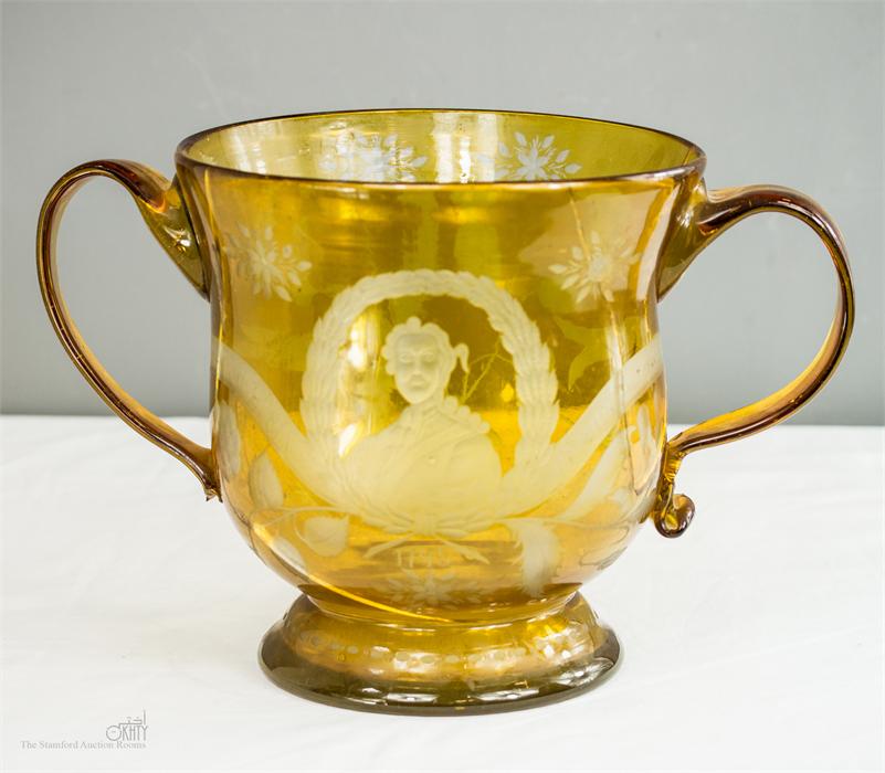 An 18th century yellow glass twin handled bowl, dated 1745 and engraved with portrait of Bonnie - Image 2 of 5