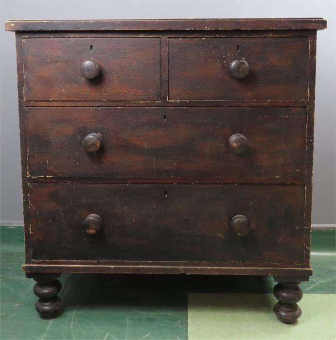 A painted pine chest of drawers, with two short over two long drawers.
