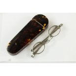 A 19th century tortoiseshell spectacles flip top case with silver plaque engraved with the