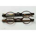 Two pairs of early 19th century tortoiseshell spectacles circa 1800. A/F