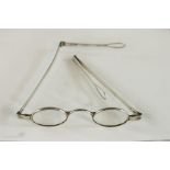 A pair of silver spectacles with mid-folding sides circa 1830.