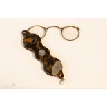 A pair of late 18th century Adams Style lorgenettes ‘Pocket Spectacles’ in tortoiseshell and