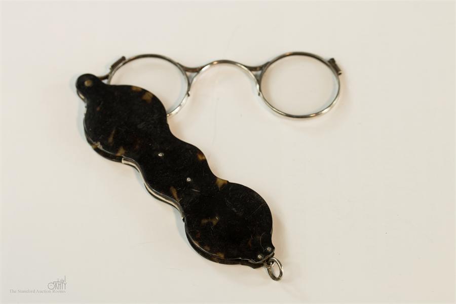 A pair of late 18th century Adams style lorgnettes ‘Pocket Spectacles’ in tortoiseshell and silver.