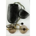 A pair of 19th century brass Chinese sunglasses, quartz lenses, rimless, curved bridge, together