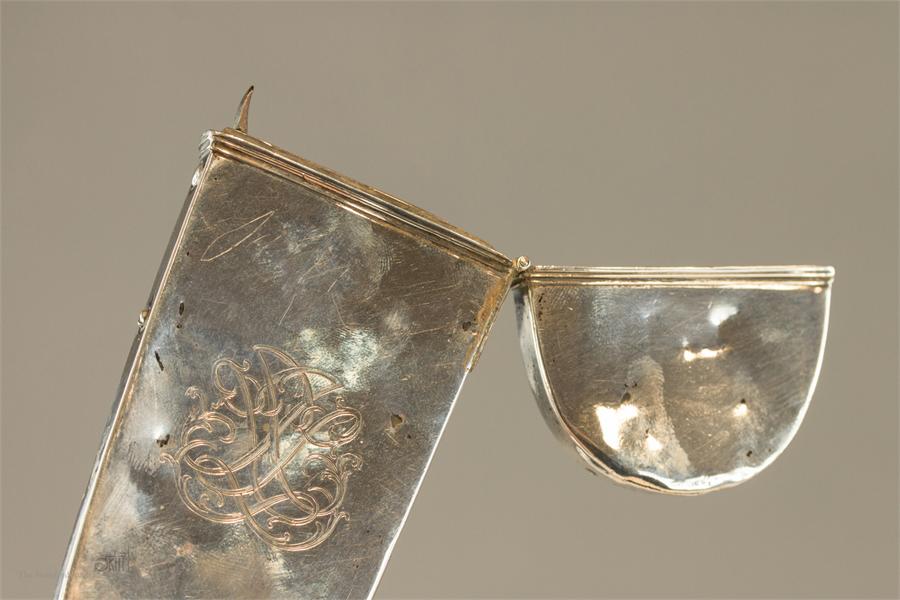 A late 19th century silver flip top spectacles case, engraved with a central motif. - Image 2 of 2