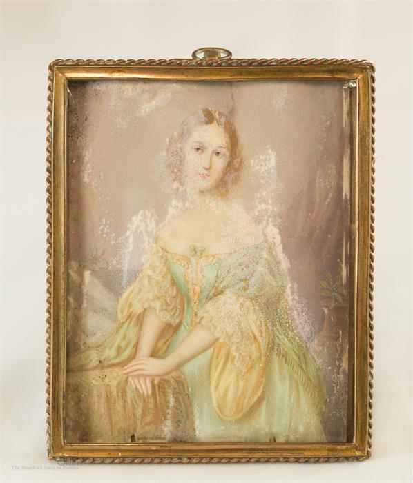 A 19th century miniature portrait of a young lady 10cm by 8½cm.
