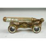 A pair of French opera glasses, in mother of pearl, with original case.