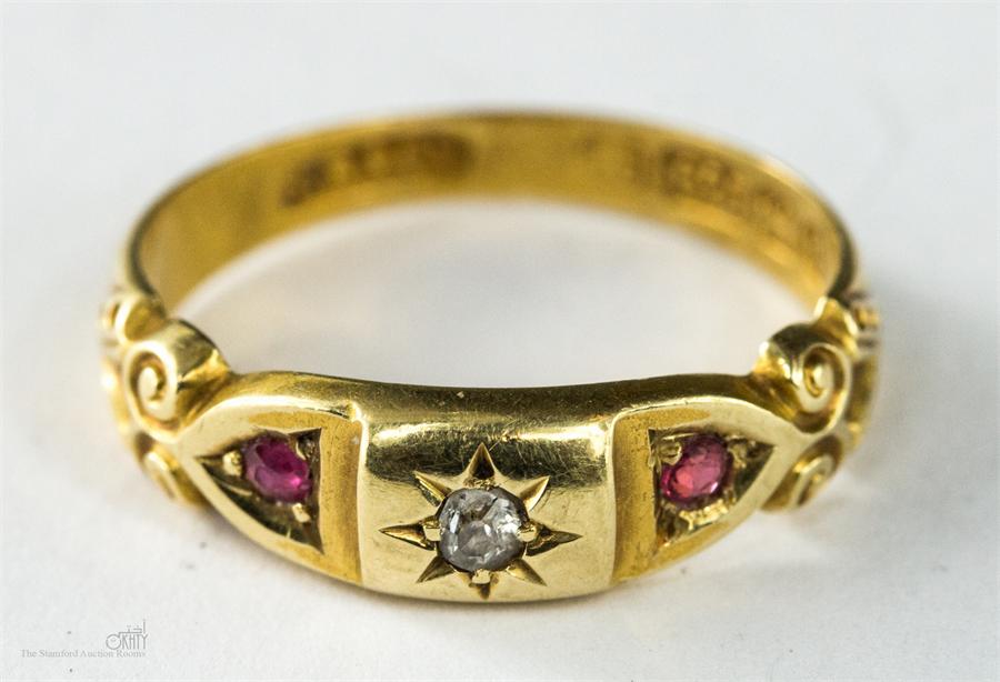 A 15ct gold ring with diamond and pink sapphire size N, 3g.