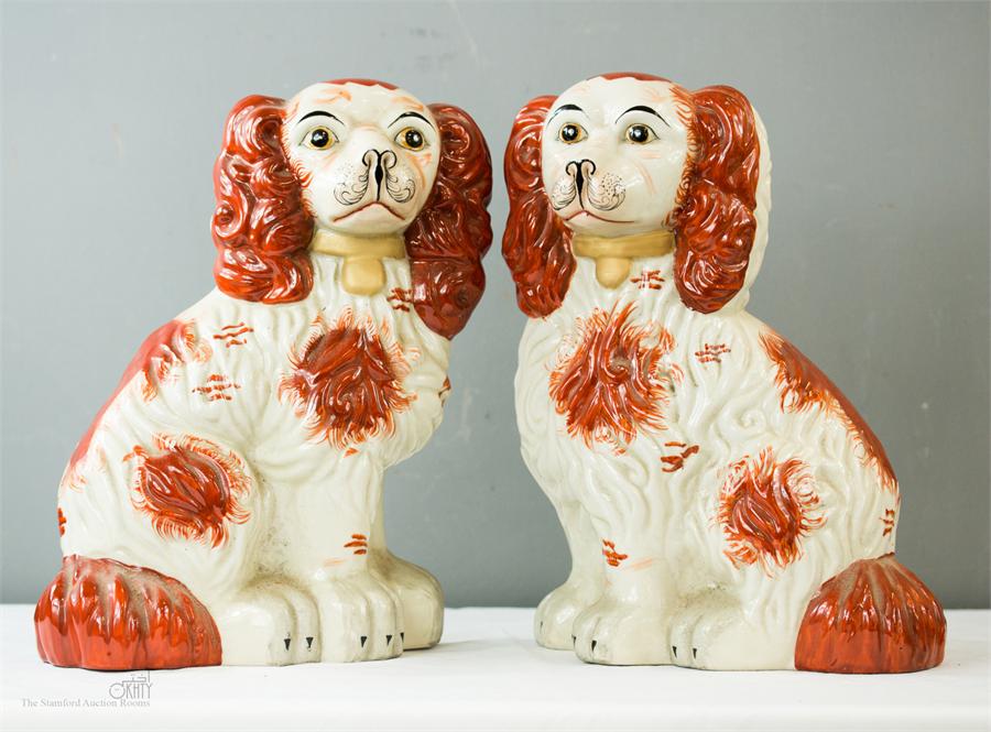 A pair of Staffordshire style dogs.