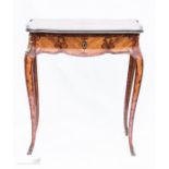 A fine French 19th century table, with a single frieze drawer, the top bearing a brass inlaid plaque