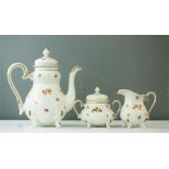 A Weimar coffee set comprising coffee pot, cream jug and sugar bowl and cover.