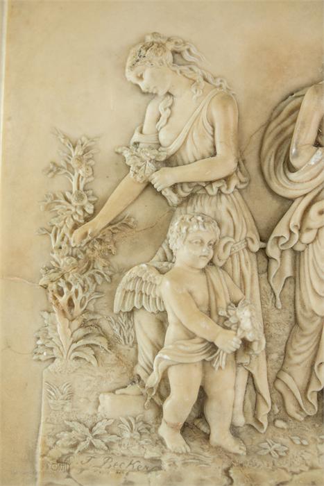 A plaque carved with a classical scene with putti, possibly made from coral. - Image 3 of 3