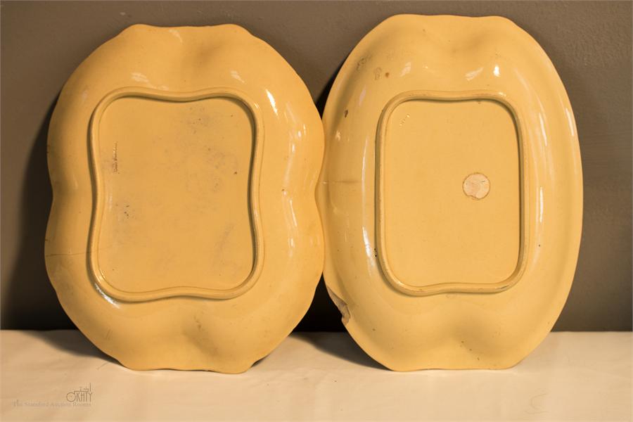 Two Drab Porcelain dishes, yellow ground with flowering plants to the centre, gilded highlights to - Image 2 of 2