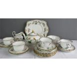 A Tuscan China Plant design part tea set, manufactured for Harrods.