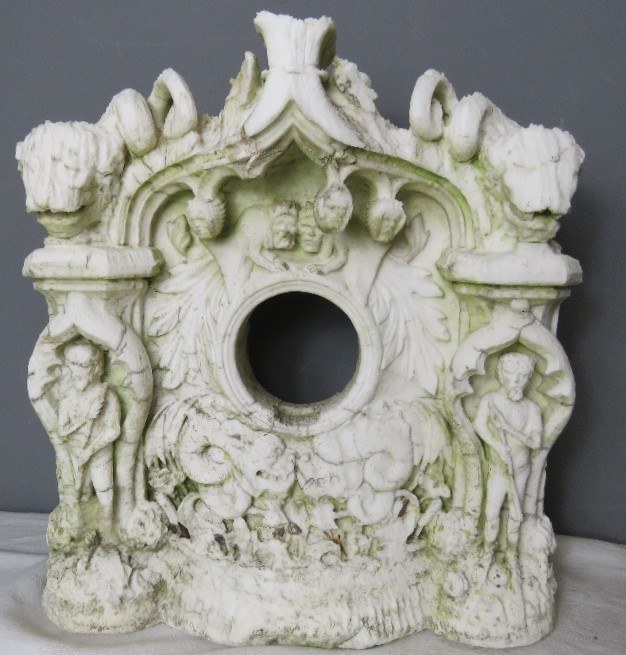 A marble carving; clock case, 38 by 36 by 11cm.