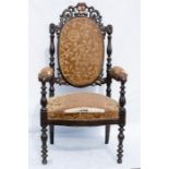 A 19th century child's chair, simulated rosewood, with pierced and carved crested top bearing