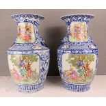 A pair of Chinese blue and white vases, with European figural scenes in polychrome, the figures