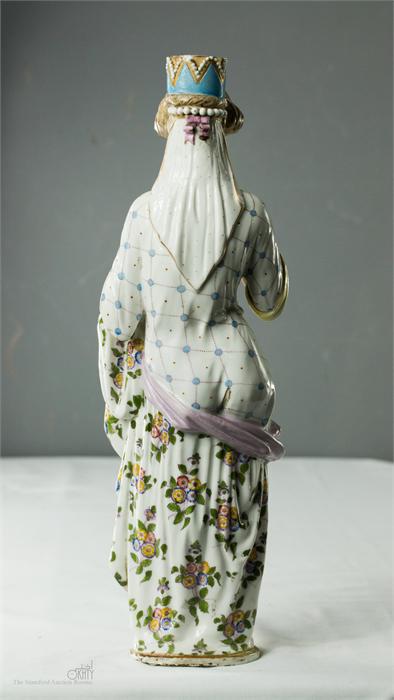 A German porcelain candlestick in the form of a lady carrying ewer and chalice, circa 1890, 35cm - Image 2 of 2