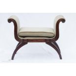 A Regency period window seat with carved decoration to the mahogany frame, 78 by 100 by 41.5cm..