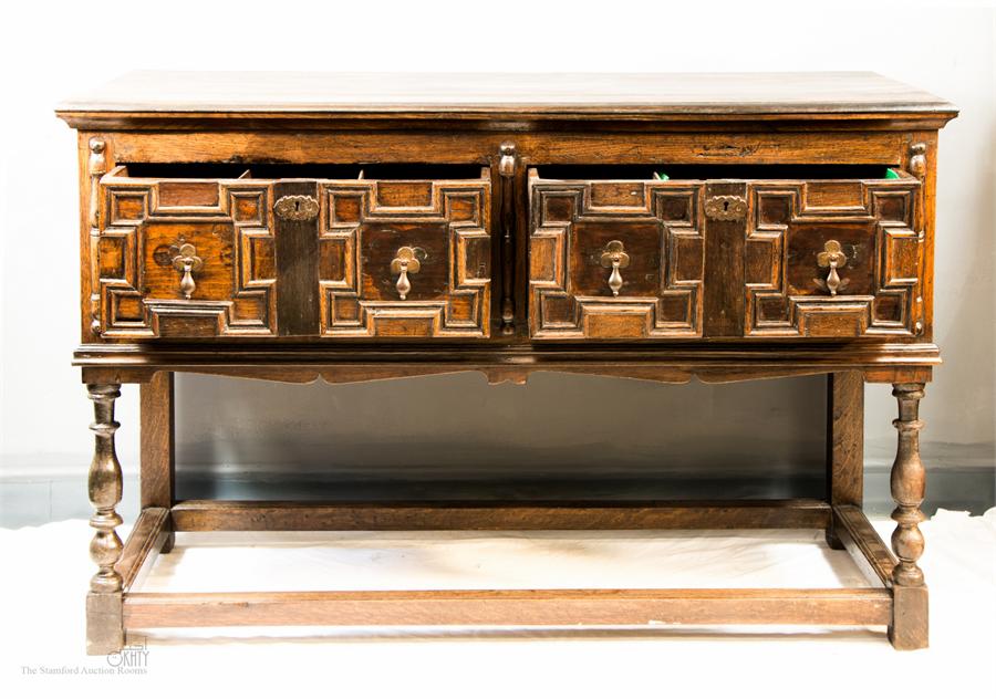 A 17th century and later dresser base with geometric moulded drawers, turned legs and peripheral - Image 2 of 3