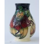 A small Moorcroft vase, dated '98 to the base, initialled KM, monogram SH, 9½cm high.